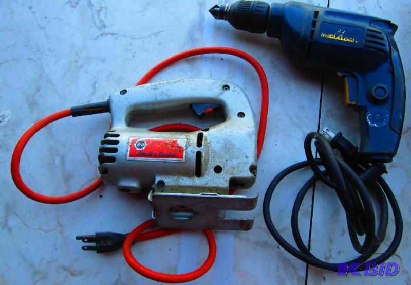 lot 37 image: Black and Decker skill saw, blade is sticking...