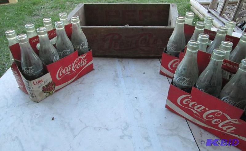 lot 69 image: 3 cases of Coca Cola bottles in a wood Pepsi ...