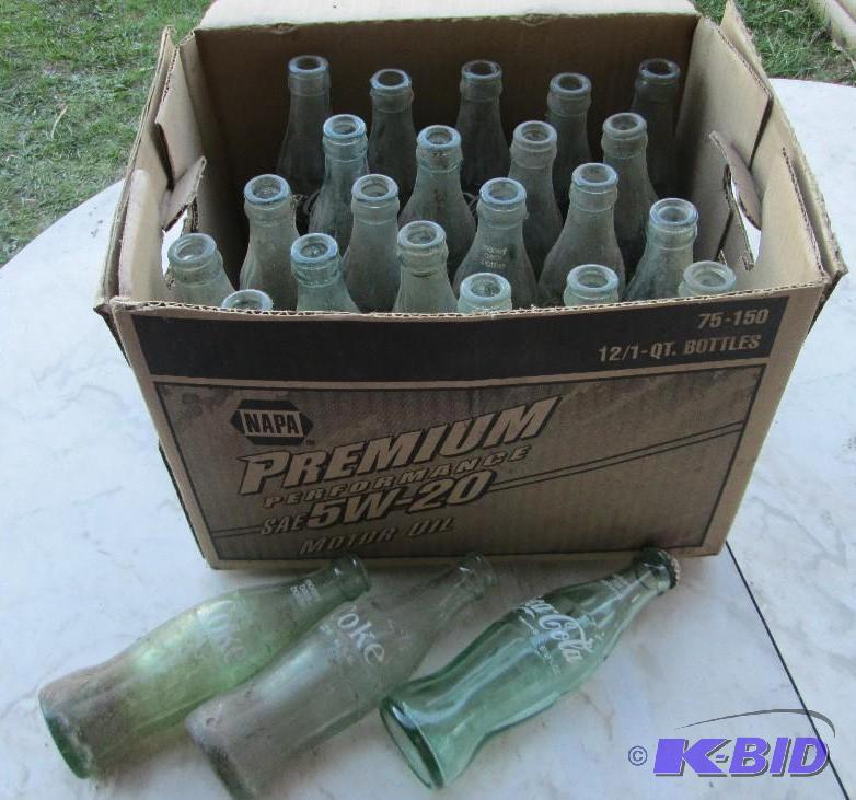 lot 70 image: Box of assorted Coca Cola bottles...