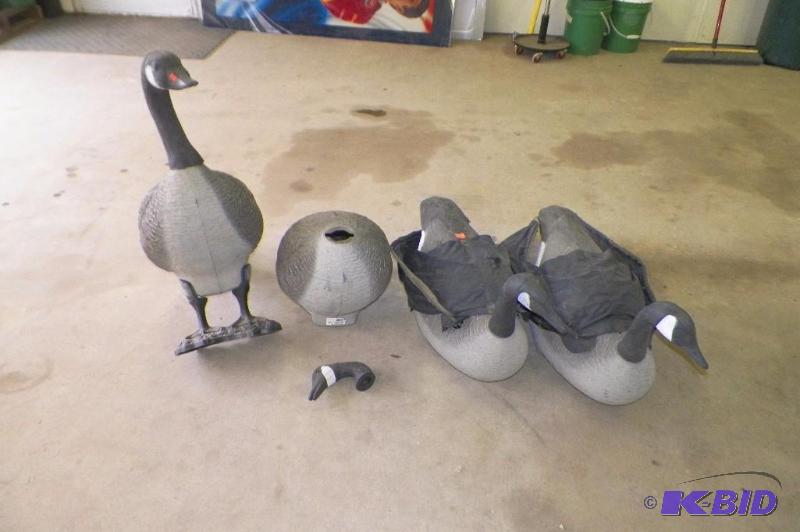 lot 15 image: 4 Goose Decoys - Duck is for size reference only