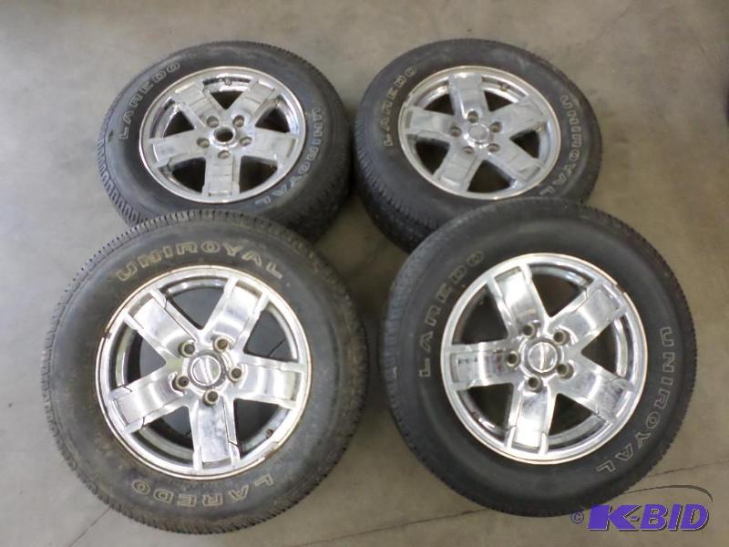 lot 110 image: (4) Jeep 5-Lug Chromed 17" Wheels With U...
