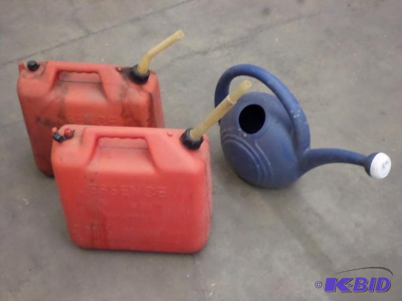 lot 29 image: (2) Gas Cans & (1) Watering Can...