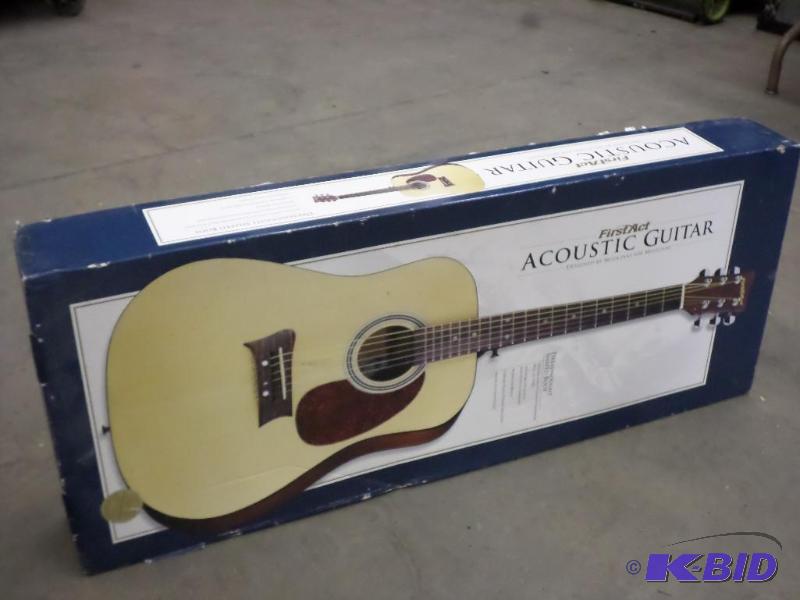 lot 44 image: First Act Accoustic Guitar...