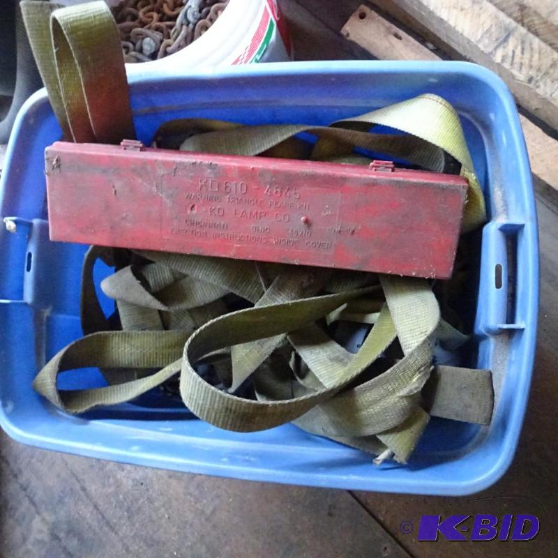 Bin full of tie down straps. Hard hats. Safet...