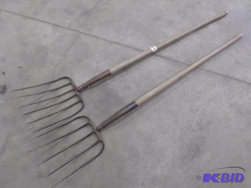 lot 55 image: (2) Long Handle Hay Forks...