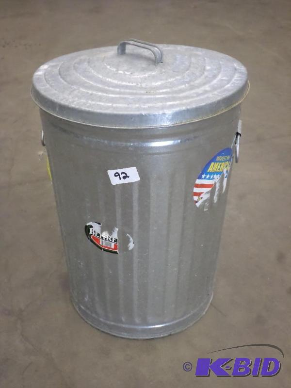 lot 92 image: 30-Gallon Lidded Trash Can...