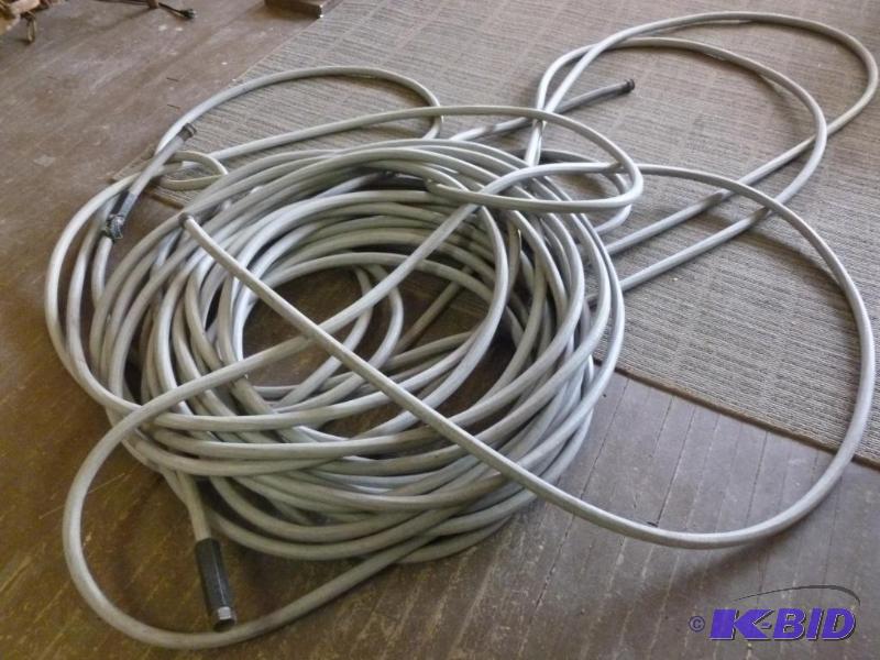 lot 113 image: Lot of two large garden hoses, good usable co...