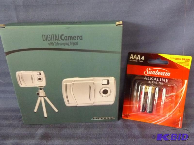lot 116 image: Premium digital camera with telescoping tripo...