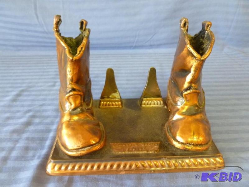 lot 15 image: Cast Bronze boots. Made 3-5-1951, measures ab...