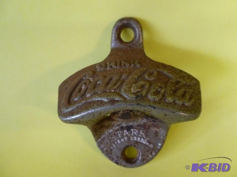 lot 193 image: Vintage Starr - Coca-Cola metal bottle opener...