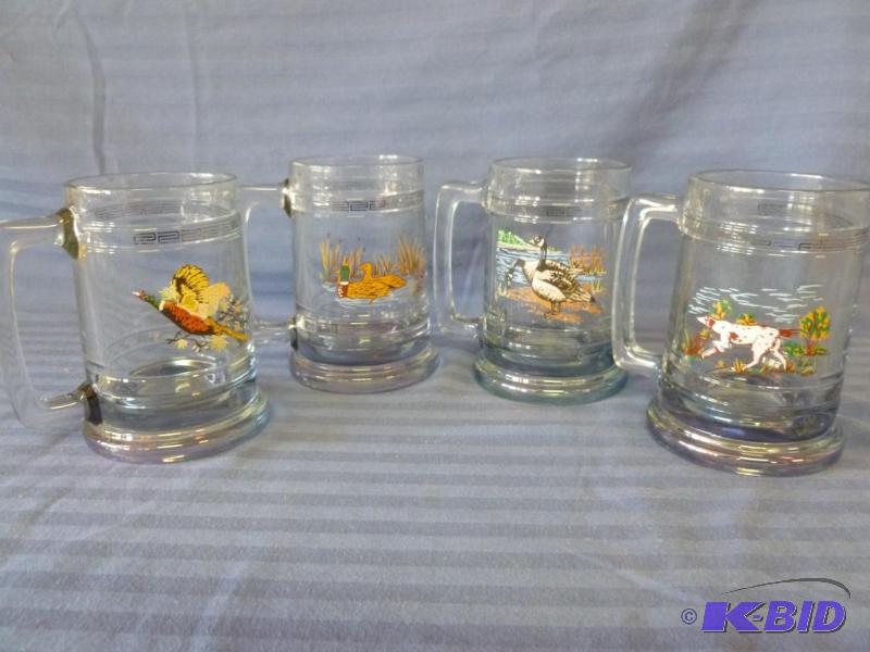 lot 23 image: Lot of four wildlife themed glass beer mugs, ...