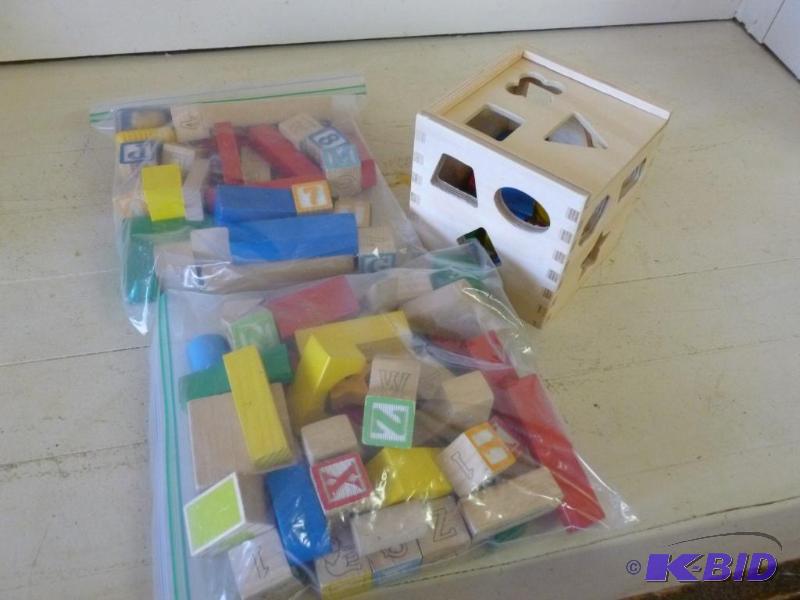 lot 82 image: Large lot of wooden toy blocks and related it...