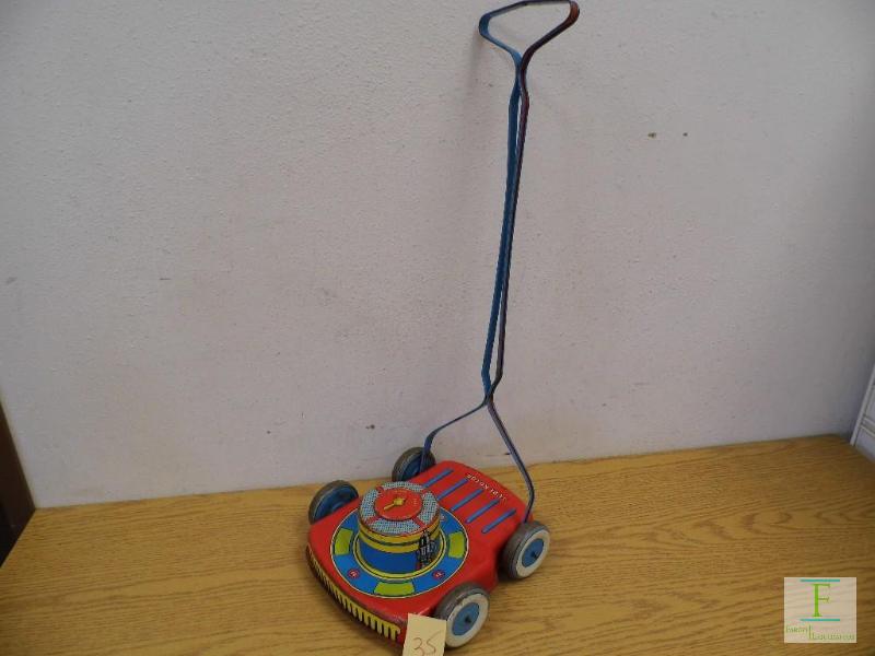 lot 35 image: Vintage Lawn Mower Toy