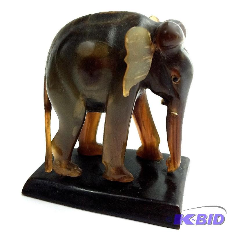 lot 8 image: Carved Amber Elephant  $$$