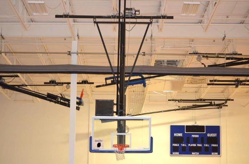 lot 13 image: Spalding ceiling mounted retractable basketba...