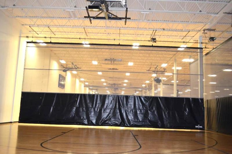 lot 21 image: Spalding 401855 Half Court Retractable Gymnas...
