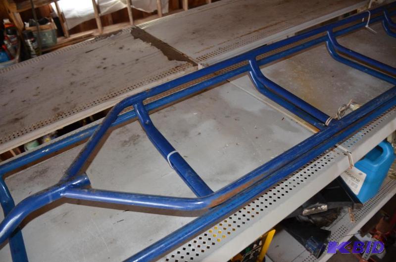 lot 148 image: Roof ladder with a hook, two 4 foot section a...