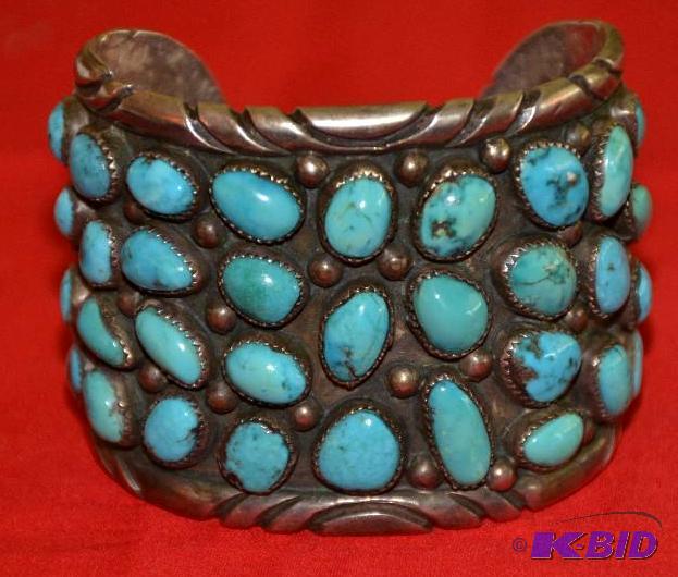 lot 17 image: Huge Sterling silver and Turquoise bracelet...