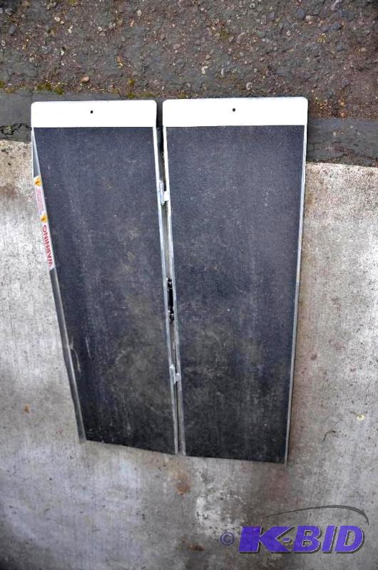 lot 216 image: Wheel chair ramp for van or steps, that folds...