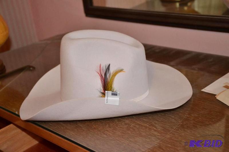 lot 88 image: Cowboy hat size 6.75 Eagle Tefon. Looks new....