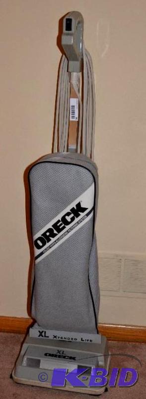 lot 96 image: Oreck Upright Vacuum- These cost over $300...