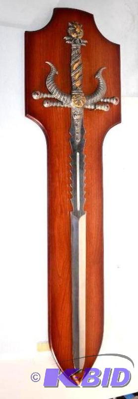 lot 102 image: Collectible sword.   Size is 43"  ...