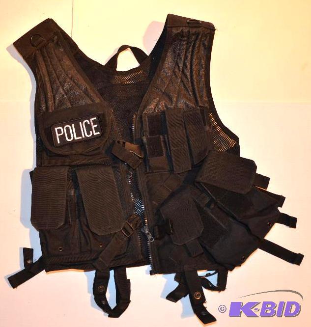 lot 5 image: Crossdraw vest     (Auctioneer Note was...