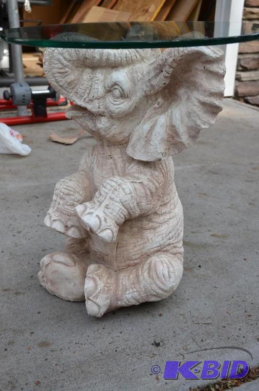 lot 75 image: Elephant glass top table 18x20"...