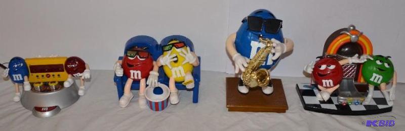 lot 78 image: Collectible M&ampM figures, one is an alarm-...
