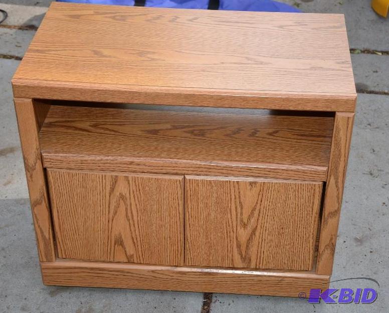 lot 95 image: Cabinet in wheels 30x16x25"  Proceeds fr...