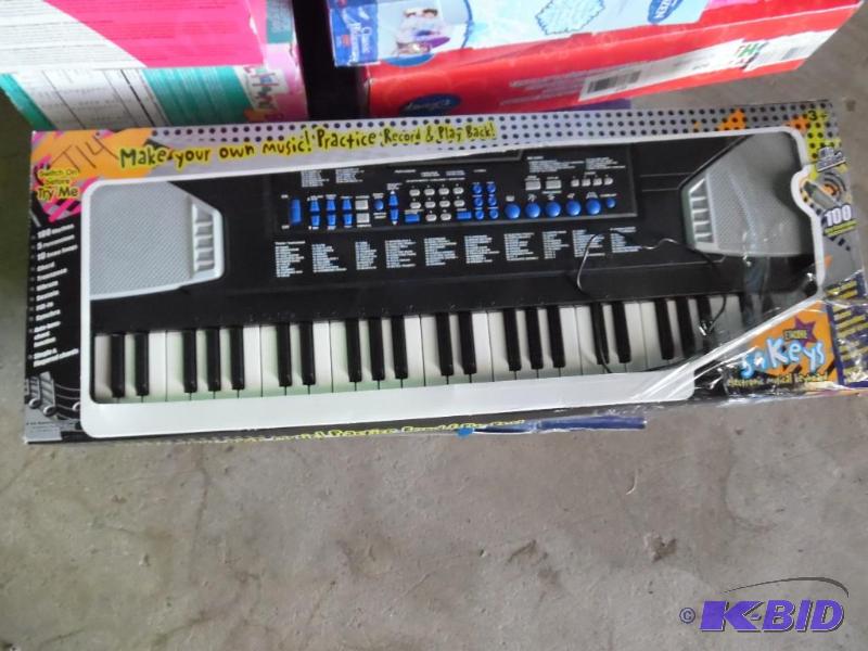 lot T14 image: Electric Keyboard...