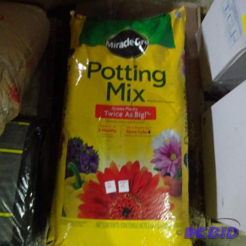 New very large bag of miracle-gro brand potti...