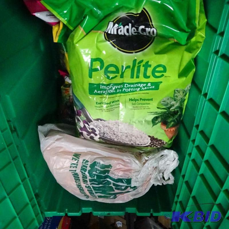 Approximately 36 pounds potting soil and 1 ba...