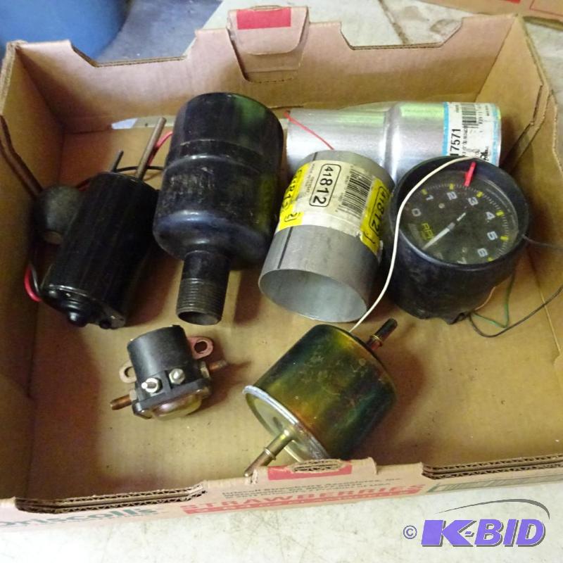 lot 131 image: Tachometer, Muffler Parts, 12 Volt Motor, Sol...