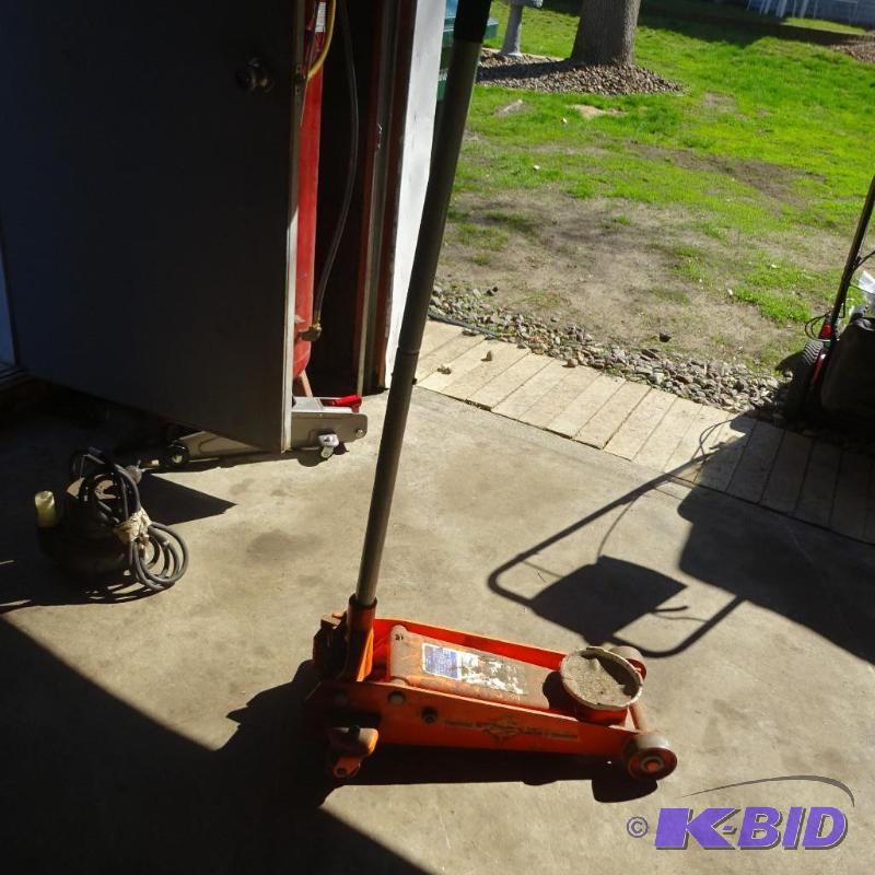 lot 76 image: 214 Ton Rolling Floor Jack Works...