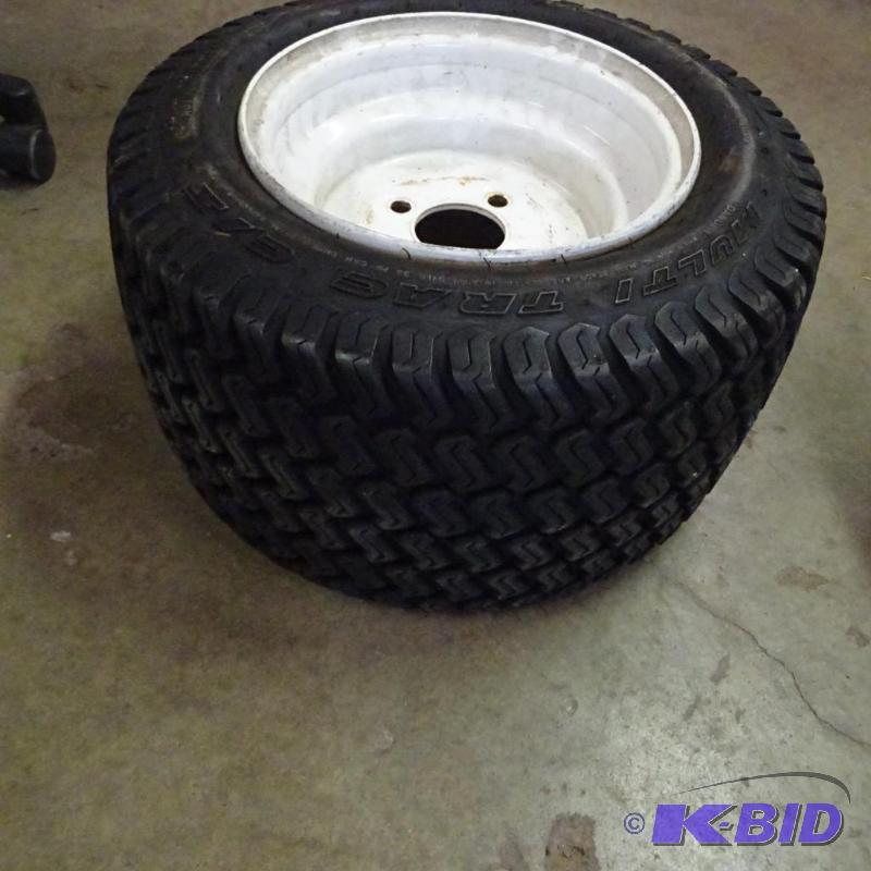 lot 19 image: Lawn Tractor Tire and Rime LIke New 18 X 10.5...