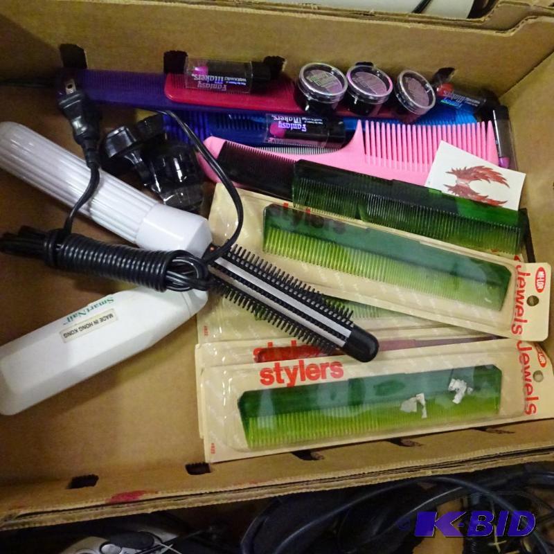 lot 93 image: Misc Combs and Hair Curlers...