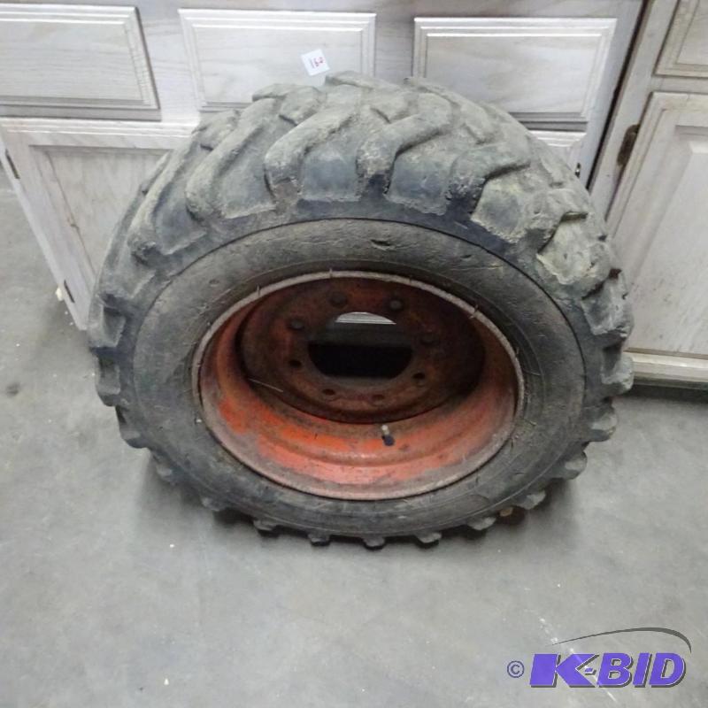 Bobcat TIre and RIm 8 Hole. Cannot Read Size....