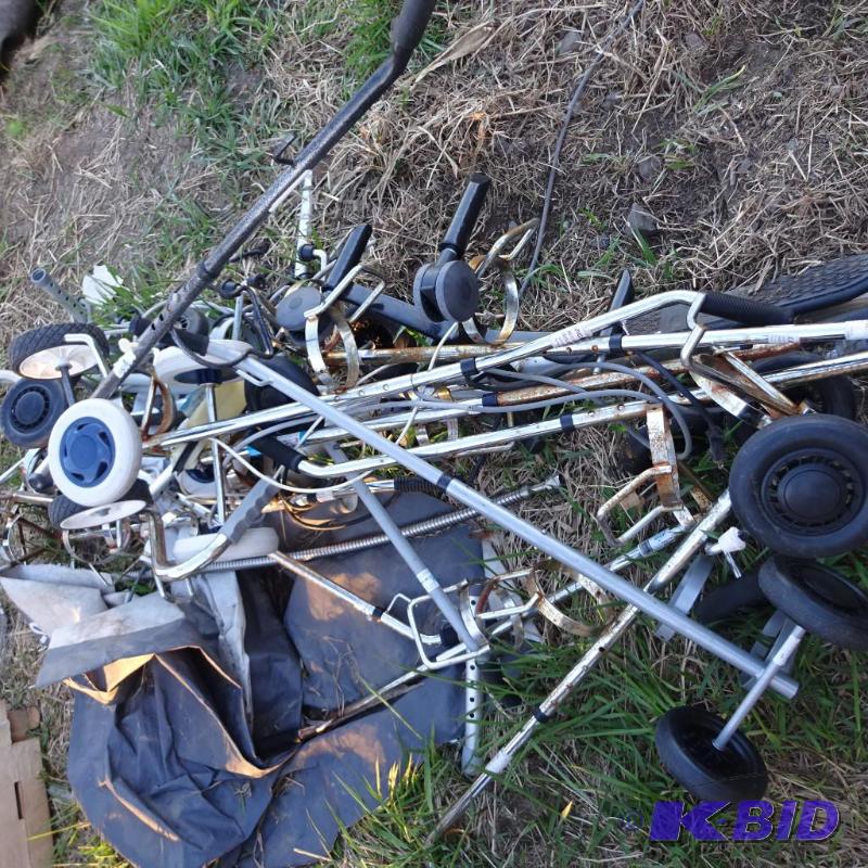 Pile of misc oxygen tank carts...