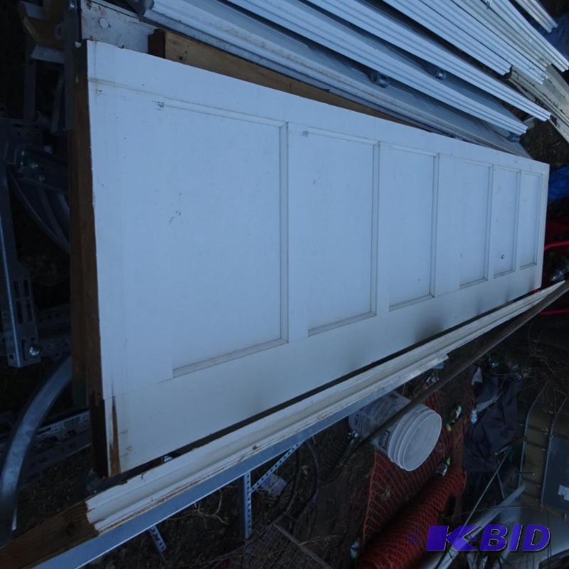 98 x 96 wood garage door. 4 panels. One panel...
