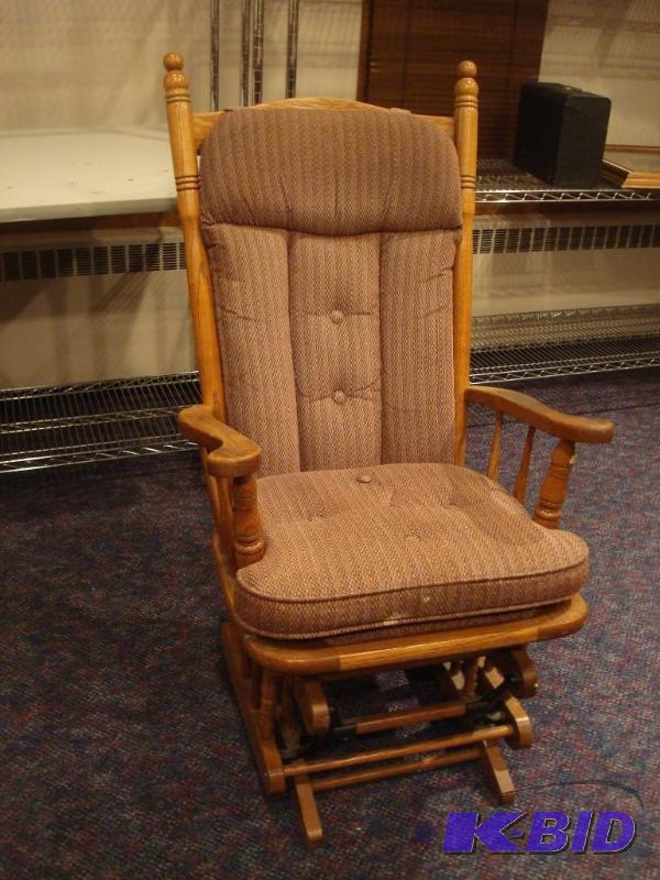 lot 14 image: Solid Oak Glider Chair. Needs A Little Cleani...