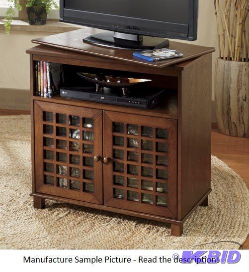 lot 36 image: Oak Mission Style Swivel Top TV Stand - No mo...
