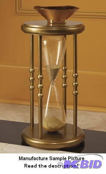 lot 42 image: Golden Hourglass Table - Glass hourglass with...