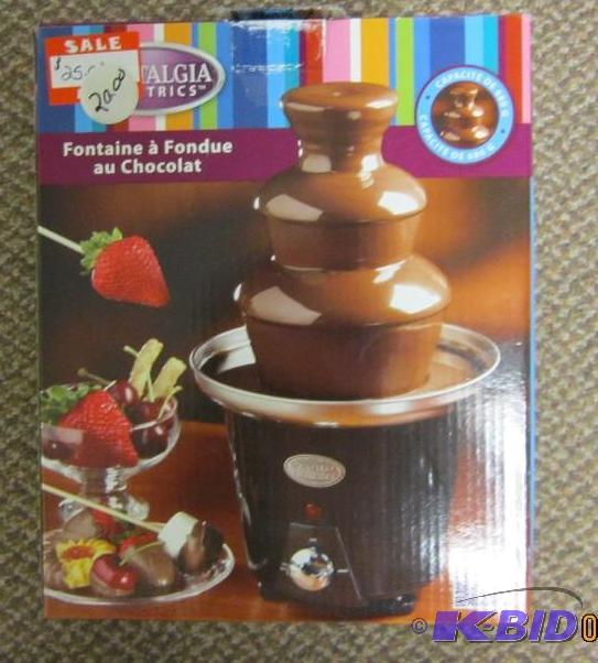 lot 5 image: Nostalgia Electrics CFF965 Mini Chocolate Fondue Fountain