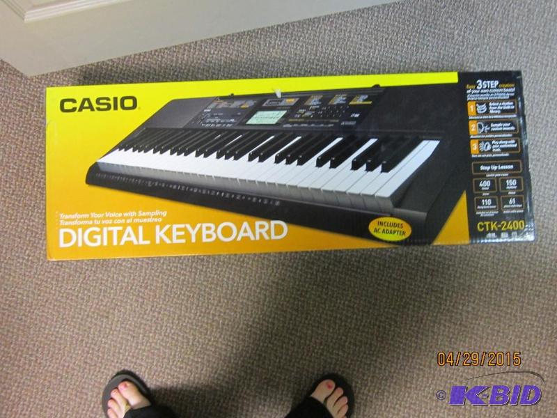 lot 7 image: Casio CTK-2400 61-Key Premium Portable