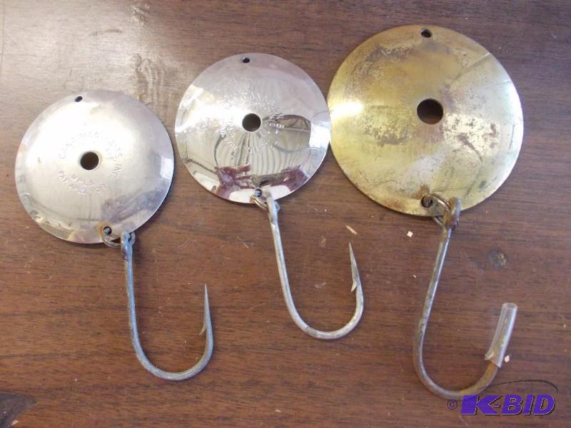 lot 111 image: 3-Large Metal Canadian Baits Inc Lures...