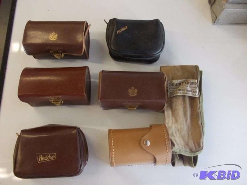lot 214 image: 7-Fishing Reel Cases...