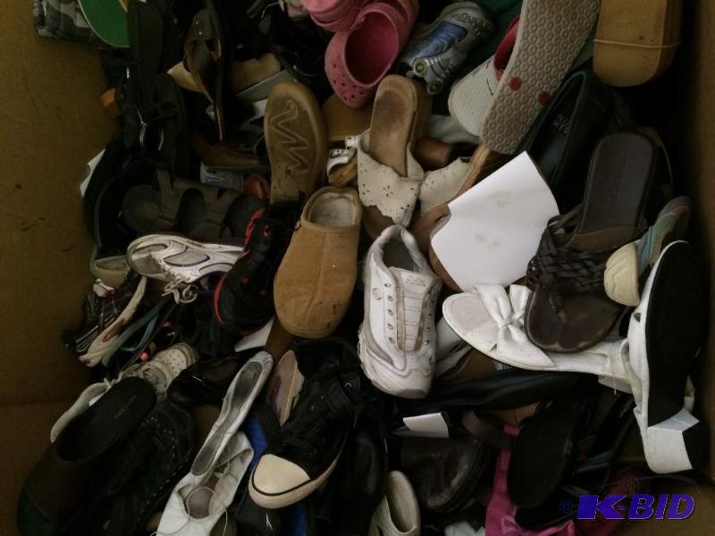 lot 10 image: bin of used shoes  over 100 pairs