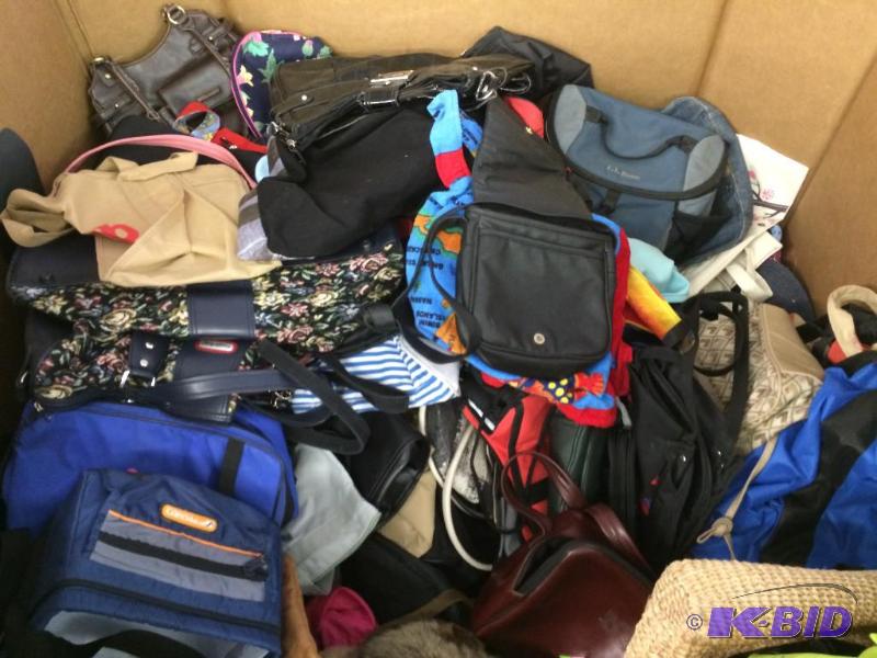 lot 9 image: bin of  used purses,bags and back packs
