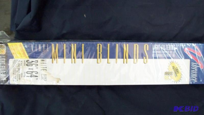 White blinds 36x64 new in box...
